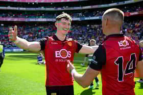 Down County Player of the Year Ryan McEvoy celebrates winning the Tailteann Cup with teammate Pat Havern in Croke Park last summer.