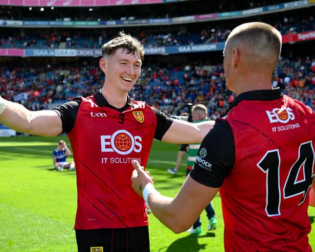Down County Player of the Year Ryan McEvoy celebrates winning the Tailteann Cup with teammate Pat Havern in Croke Park last summer.