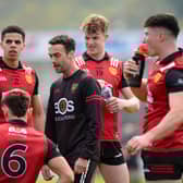 Conor Laverty has a word with his players ahead of their game against Limerick last year.