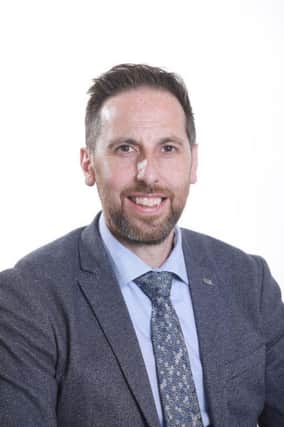 DUP Cllr Jonathan Jackson.