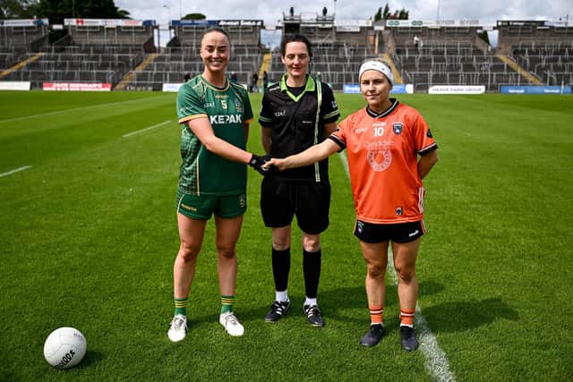 Referee Maggie Farrelly, centre, with Meath captain Aoibhín Cleary, left, and Armagh captain Lauren McConville before the TG4 All-Ireland Ladies Football Senior Championship Round 1 match between Meath and Armagh at Páirc Tailteann in Navan, Meath. Pic: Ben McShane/Sportsfile