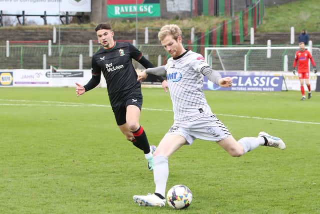 Sports Direct Premiership 16/12/2023Glentoran vs Newry CityGlentoran’s David Fisher with Ryan McGivern of Newry CityMandatory Credit ©INPHO/Declan Roughan