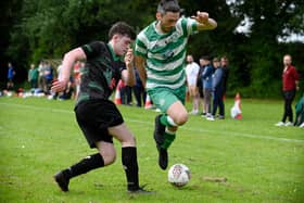 Cleary Celtic's Owen Donaghy takes on Camlough's Oran O'Callaghan last season. Camlough had a good day on Saturday progressing in the Junior Cup with a 2-1 victory, while Cleary crashed out in their tie.