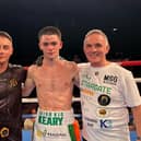Donagh Keary after his emphatic win in MSG flanked by coach Ryan Burnett and Co Manager Bobby Lavery.
