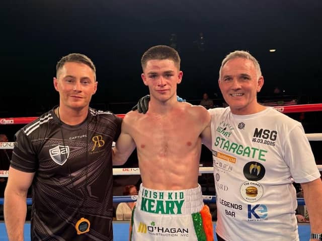 Donagh Keary after his emphatic win in MSG flanked by coach Ryan Burnett and Co Manager Bobby Lavery.