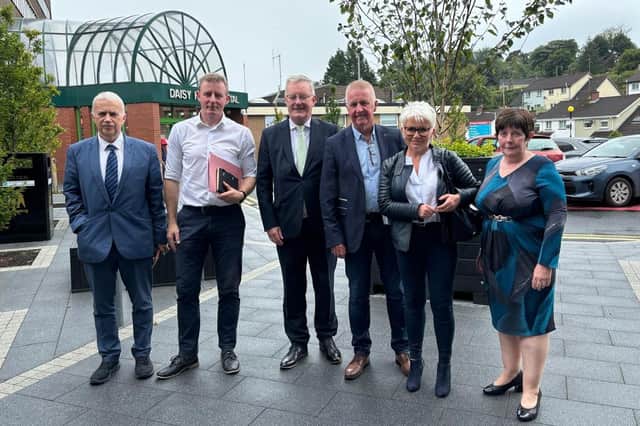 SOS Daisy Hill representatives with Health Minister Mike Nesbitt outside Daisy Hill Hospital.