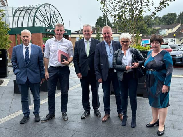 SOS Daisy Hill representatives with Health Minister Mike Nesbitt outside Daisy Hill Hospital.