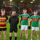 The captains of Abbey CBS and St Patrick's pictured with the referee ahead of their MacRory Cup clash at Pairc Esler on Wednesday evening. Credit: Ulster Schools GAA