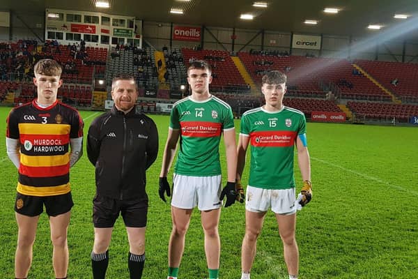 The captains of Abbey CBS and St Patrick's pictured with the referee ahead of their MacRory Cup clash at Pairc Esler on Wednesday evening. Credit: Ulster Schools GAA