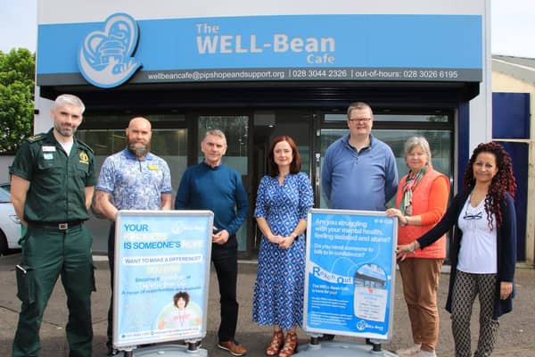 Professor Siobhan O'Neill, Mental Health Champion for Northern Ireland  recently visited The WELL-Bean (Crisis) Cafe in Newry to show her support L-R Chris Doherty Clinical Pathways Lead Ambulance Service, Richard Gardner Service Co-ordinator ILS SHSCT,  Seamus McCabe CEO PIPS Hope and Support , Professor Siobhan O’Neill, Mental Health Champion for N.I, Mark Brownlee Peer Support Worker SHSCT,  Liz McGrath Towards Zero Suicide Service Manager Southern Trust, Naj Basketfield Clinical Lead & Deputy CEO PIPS Hope and Support.INNR1959