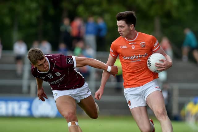 Armagh’s Ben Crealey looks to get past Galway’s Billy Mannion during their meeting in 2023.