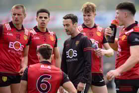 Down manager Conor Laverty speaks to his players.