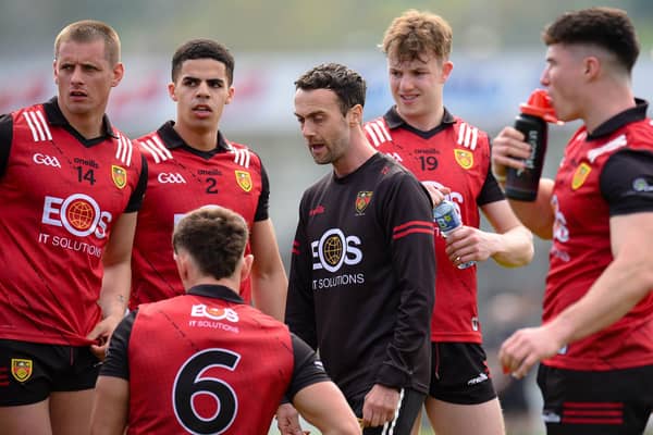 Down manager Conor Laverty speaks to his players.