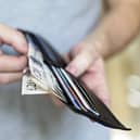 There are calls for more businesses to implement the Real Living Wage.