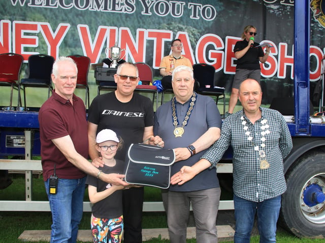 Paul Quinn and Chloe accept their award for Large Commercial Vehicle a 1721 Leyland FG from Chairperson Kilbroney Show Committee, Garett Fitzgerald, Council Chairperson Councillor Glyn Hanna and Thomas Braham President Newry Lions. INNR2531