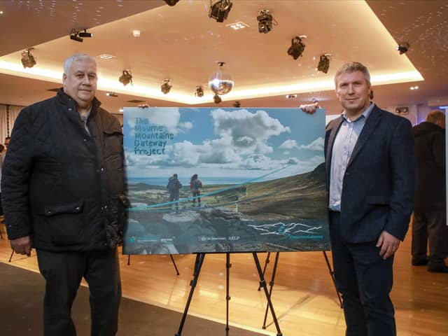 Cllr Glyn Hanna (left) co-chair of the Mourne Mountains Gateway Project Programme Board and Michael Mitchell, Project Lead, Arup at a public engagement session for the Mourne Mountains Gateway Project at O’Hare’s, Newcastle on 7 November.