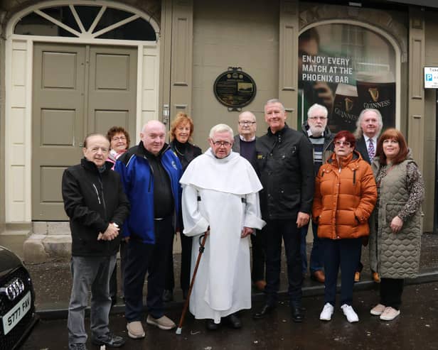 James McArevey Chairperson Newry Maritime Association with Fr. Tumilty, Ian Noble great, great Grandson of the Late Captain John Quinn who proudly unveiled the Commemorative Plaque with members of Newry Maritime Association. INNR4537