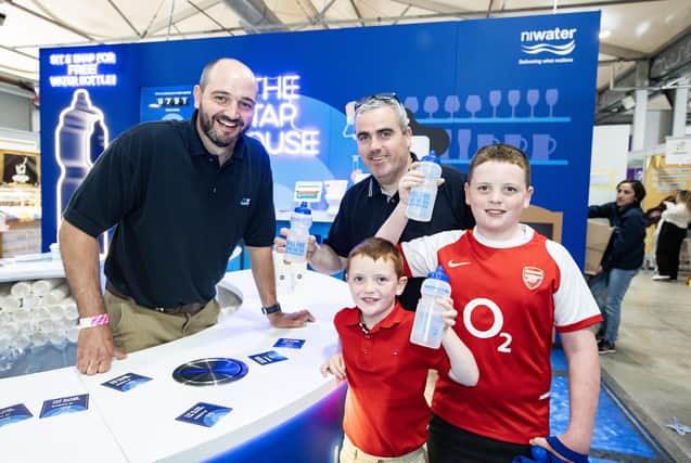 Luke, Noah and Richard Garvey from Dromintee with David Wright, NI Water.