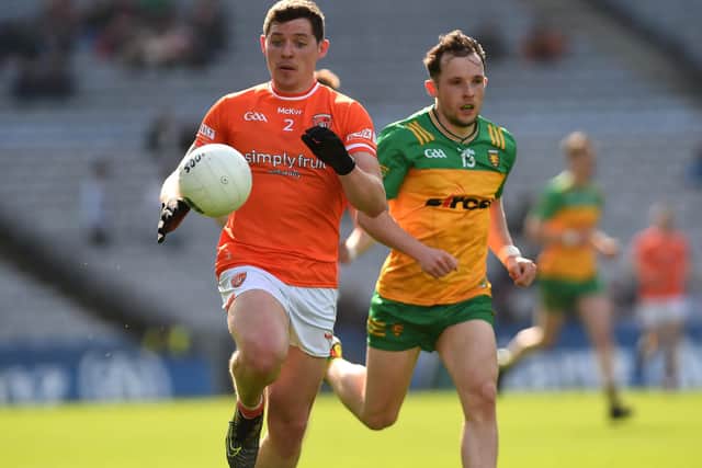 Armagh's Paddy Burns gets away from Donegal's Aaron Doherty during the 2024 Allianz Football League Division 2 final.