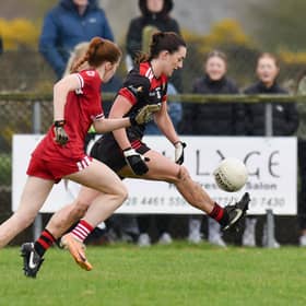 Clara Mulvenna takes on Louth's Lucy White at Ardglass on Sunday. Pic: Brendan Monaghan
