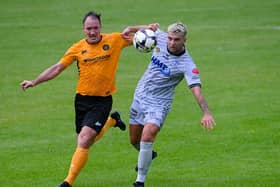 Newry's Adam Salley beats Carrick Rangers defender Albert Watson to the ball in their August meeting. Pic: Brendan Monaghan