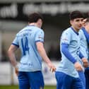 Warrenpoint Captain Jim O'Hanlon congratulates Michael Leddy after his second goal on Saturday. BM11