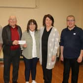 Presenting a cheque for £360 to SAH proceeds from Indoor Bowling Charity Pairs in Warrenpoint Panto Club last Tuesday evening are L – R Mickey Morgan (Son), Jimmy McAlinden (presenting cheque for £360), Teresa Russell (Daughter), Martina Gaine (Daughter), and Darren O’Hare (Chairman Warrenpoint Panto Bowling Club).