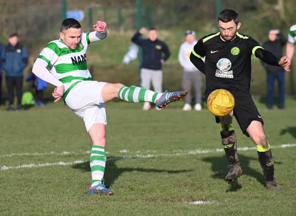 Newry Celtic’s Keith Johnston (left) scored twice as they picked up a valuable three points on Saturday.