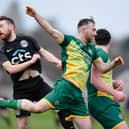 Ballyholland's Ryan Connolly scored twice as they progressed in the Fr Davies Cup on Saturday.