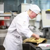 Lubo Mulkerns works in the kitchen during the NI Final of the Springboard FutureChef competition.
