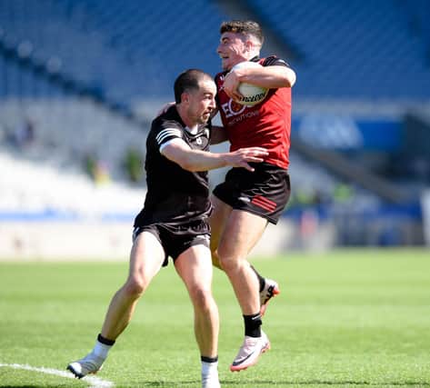 Down's Daniel Guinness in action against Limerick in Croke Park.