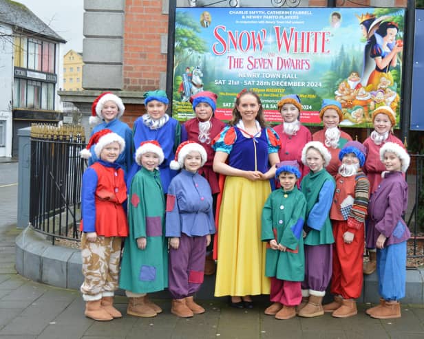 Snow White (Judith Quinn) and the two teams of seven dwarfs.