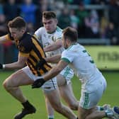Crossmaglen's Stephen Morris under pressure from Granemore's Kieran Doyle and Ross Finn