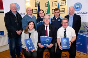 Mayobridge Five-Year Strategic Plan committee members Pat-Joe Magee, Ciaran Cunningham, Cindy Griffin, Michael Goss, Declan Mason, Roisin Woods and Sean Rooney pictured with GAA President Jarlath Burns. Picture: Brendan Monaghan