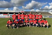 Newry City AFC players wearing the British Heart Foundation t-shirts.