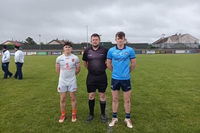 The Armagh and Dublin U17 captains with referee Christopher Brady.