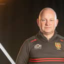 Down Assistant Manager Mickey Donnelly.