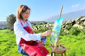 Artist Caroline Gallagher Lavery at work.
