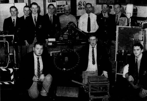 Students from St Colman's College, Violet Hill, have recorded continued success at A Level Design and Technology. Pictured with their major projects are Seamus McLaughlin (Creggan), Cathal Grant (Mayobridge), Philip Tumelty (Dundrum), Wayne Farrell (Hilltown) and Kieran McConville (Warrenpoint) with Mr Stephen McKevitt, Department Technician, Mr Robert Barton, Head of Department and other students.