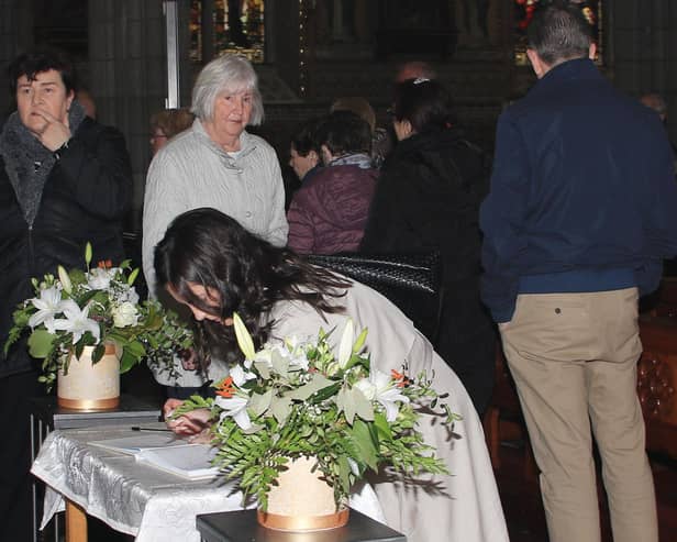 Signing the Book of Condolence in memory of Pope Francis INNR1707